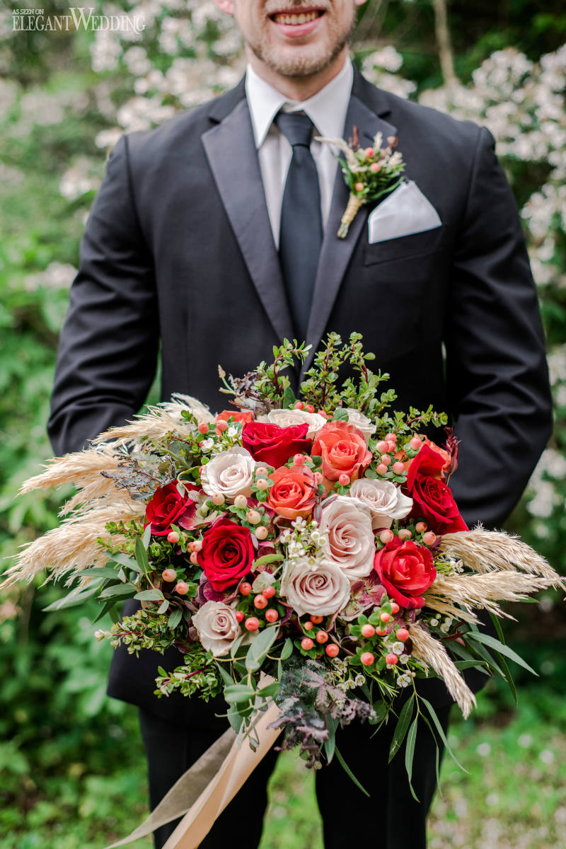 pretty wedding in a garden8 groom with wedding bouquet